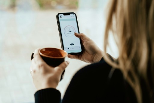 person holding cup of coffee